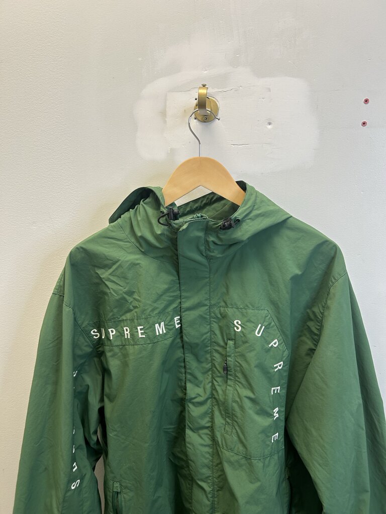 Preowned Supreme Green Spell Out Hooded Windbreaker size L