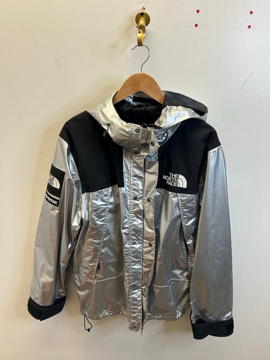 Preowned Supreme Silver TNF Windbreaker sz.Large