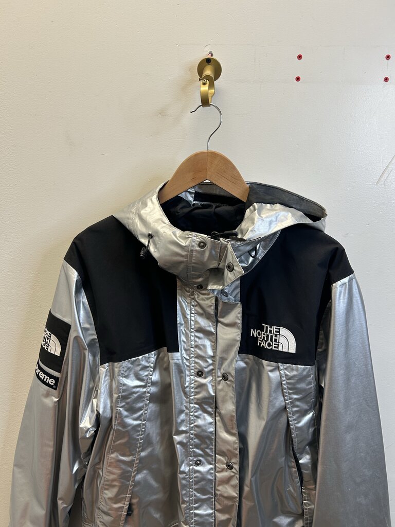 Preowned Supreme Silver TNF Windbreaker sz.Large