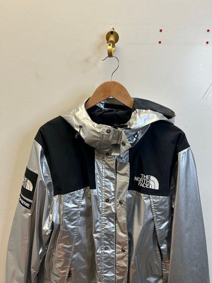 Preowned Supreme Silver TNF Windbreaker sz.Large