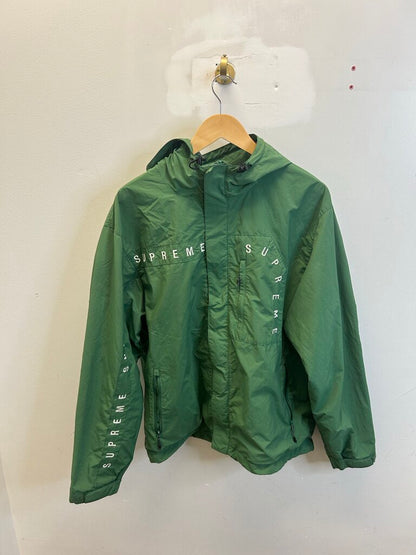Preowned Supreme Green Spell Out Hooded Windbreaker size L