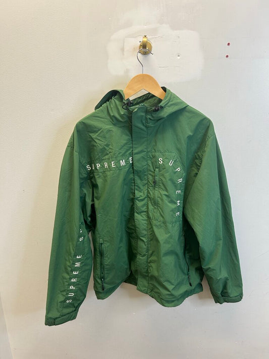Preowned Supreme Green Spell Out Hooded Windbreaker size L