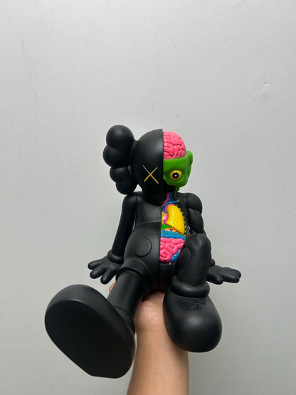 Preowned KAWS Resting Place Black Xray Laying Down Figure (NO BOX)