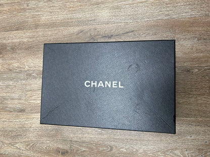 Preowned Chanel White Silver Runner Sz.42